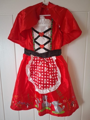 Children dressing girl - up,